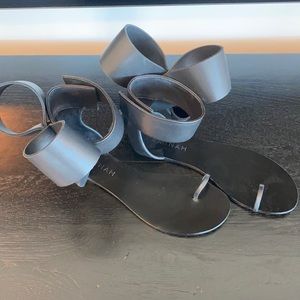 Amina black leather bow sandals